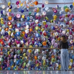 A powerful installation of inflated birthday balloons to mourn missed loved ones