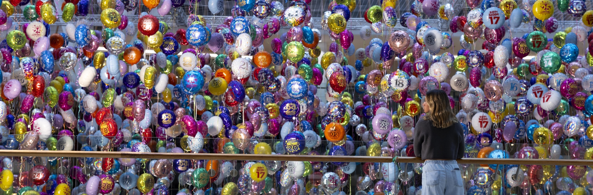 A powerful installation of inflated birthday balloons to mourn missed loved ones