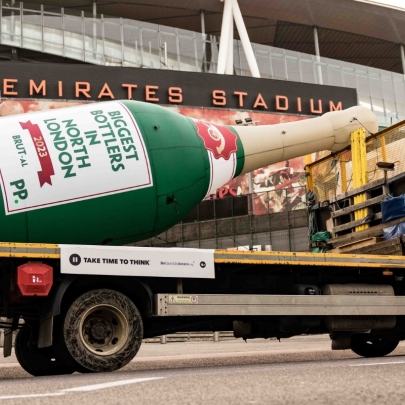 Gunner bottle it: Paddy Power delivers an 18ft bottle to Arsenal following title race collapse